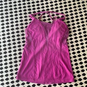 Well loved Lululemon bra top with built in padding and support. Magenta
